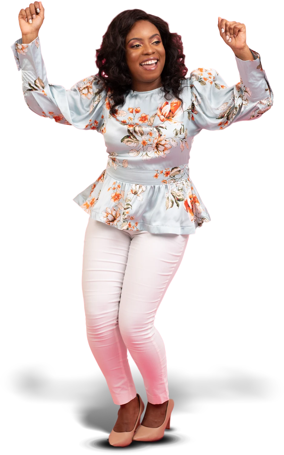 Shurnelle raising her arms with a joyful expression